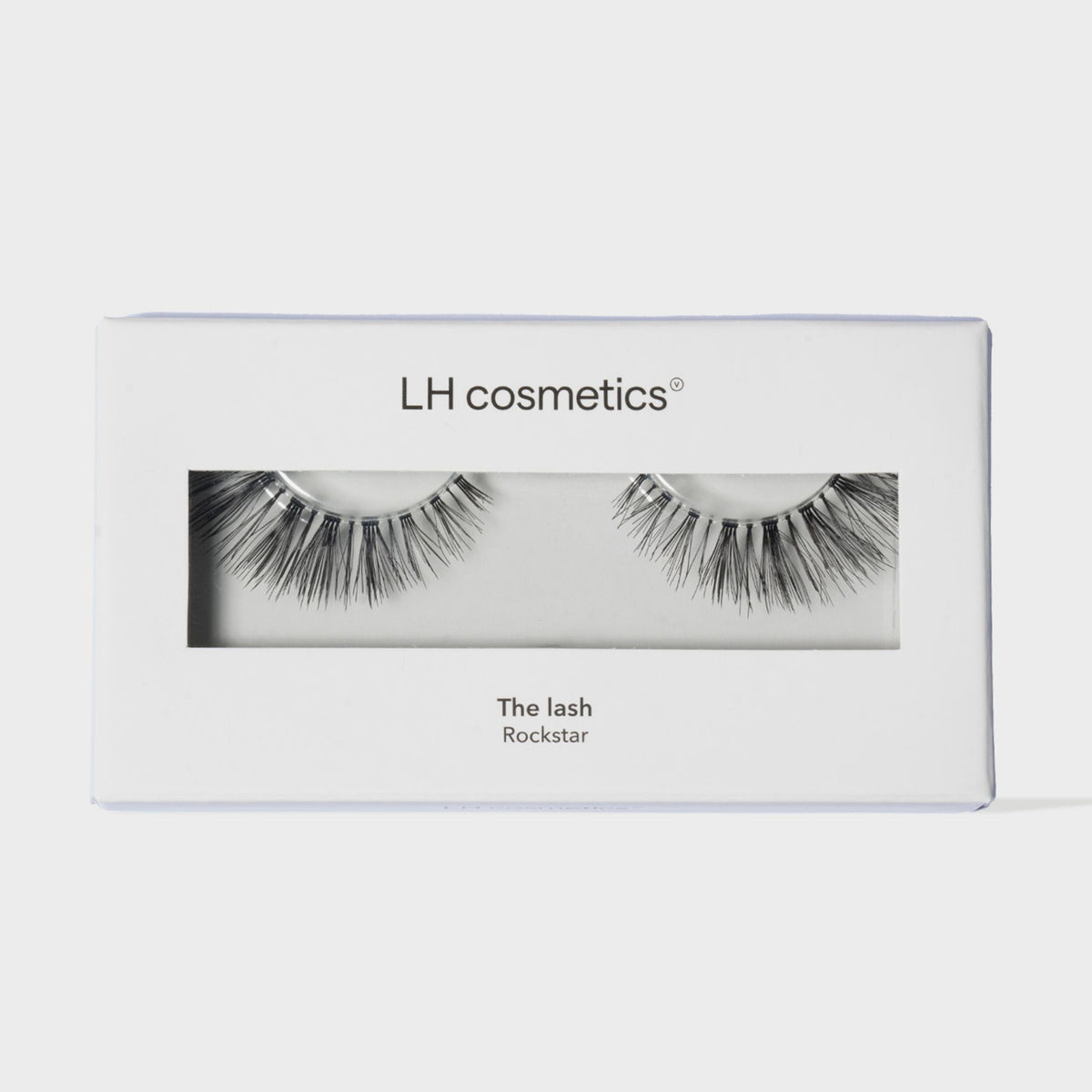 Weiße Verpackung der "The Lash" Wimpern im Stil "Rockstar" von LH Cosmetics auf weißem Hintergrund.