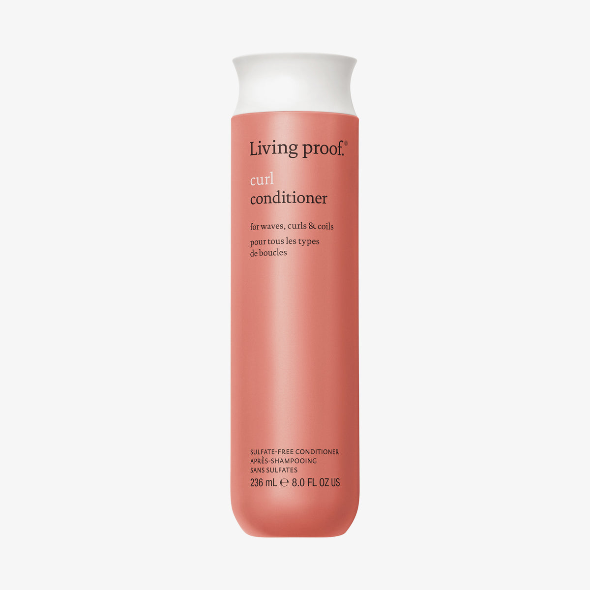 Rosane Flasche Living Proof Curl Conditioner mit weißem Deckel auf weißem Hintergrund.