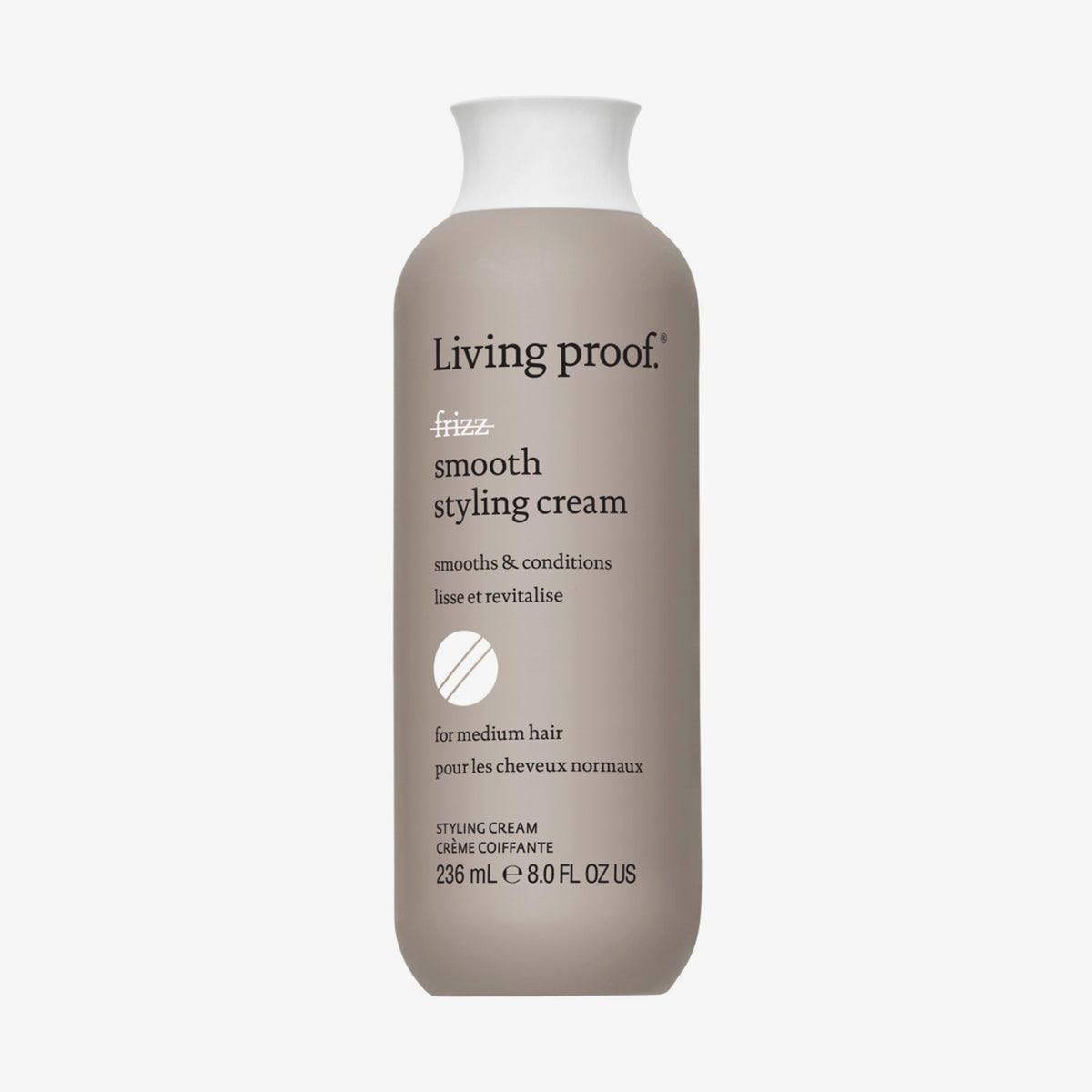Beige Flasche Living Proof No Frizz Smooth Styling Cream mit weißem Deckel vor weißem Hintergrund.