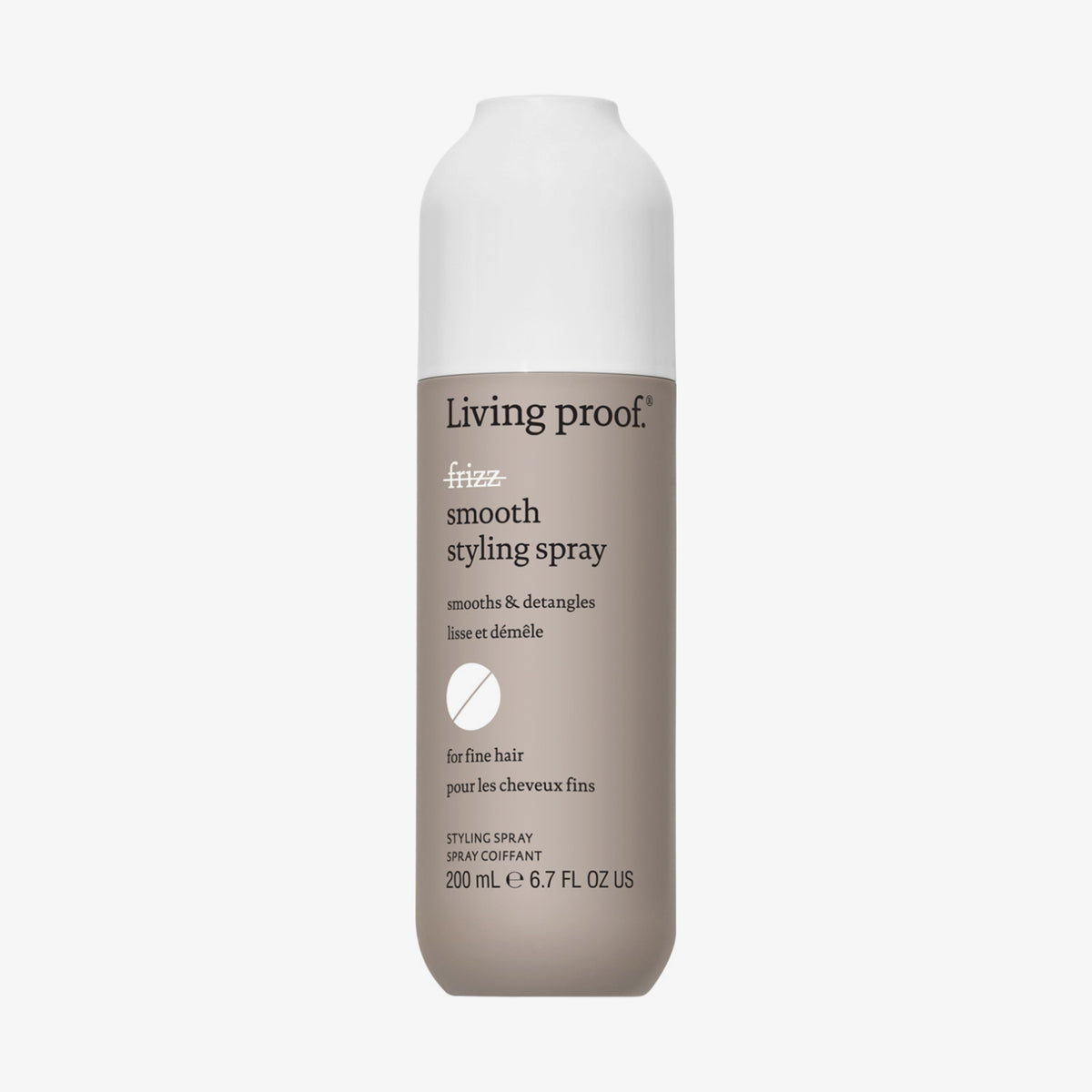 Beige Flasche Living Proof No Frizz Smooth Styling Spray mit weißem Deckel vor weißem Hintergrund.