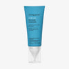  Blaue Tube Living Proof Scalp Care Dry Scalp Treatment mit weißem Applikator und transparentem Deckel.