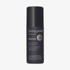 Schwarze Sprühflasche Living Proof Style Lab Blowout mit weißem Text auf weißem Hintergrund.