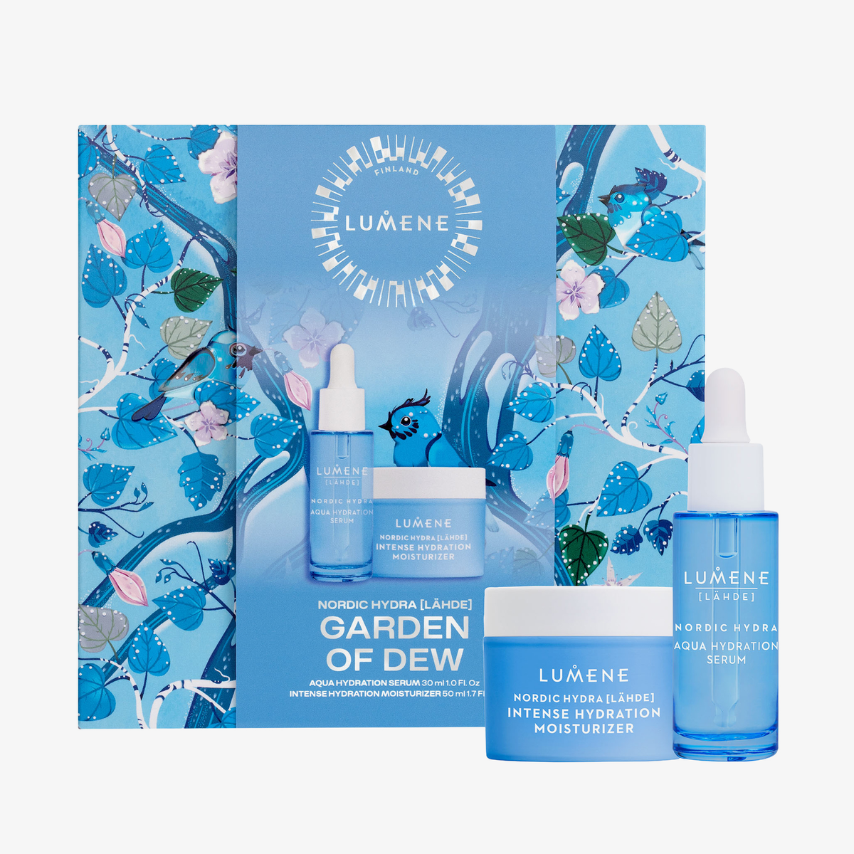 Lumene GARDEN OF DEW SET 2026 mit blauer Feuchtigkeitscreme, Serum und blumiger Verpackung im Hintergrund.