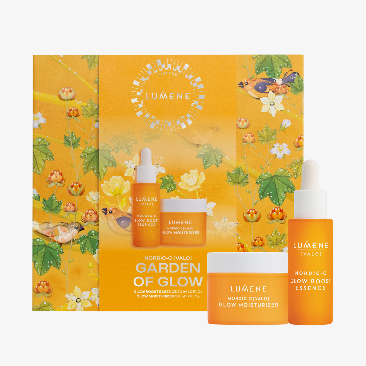 Lumene GARDEN OF GLOW SET 2026 mit Glow Boost Essence und Feuchtigkeitscreme, präsentiert in einer blumig-orangefarbenen Schachtel.