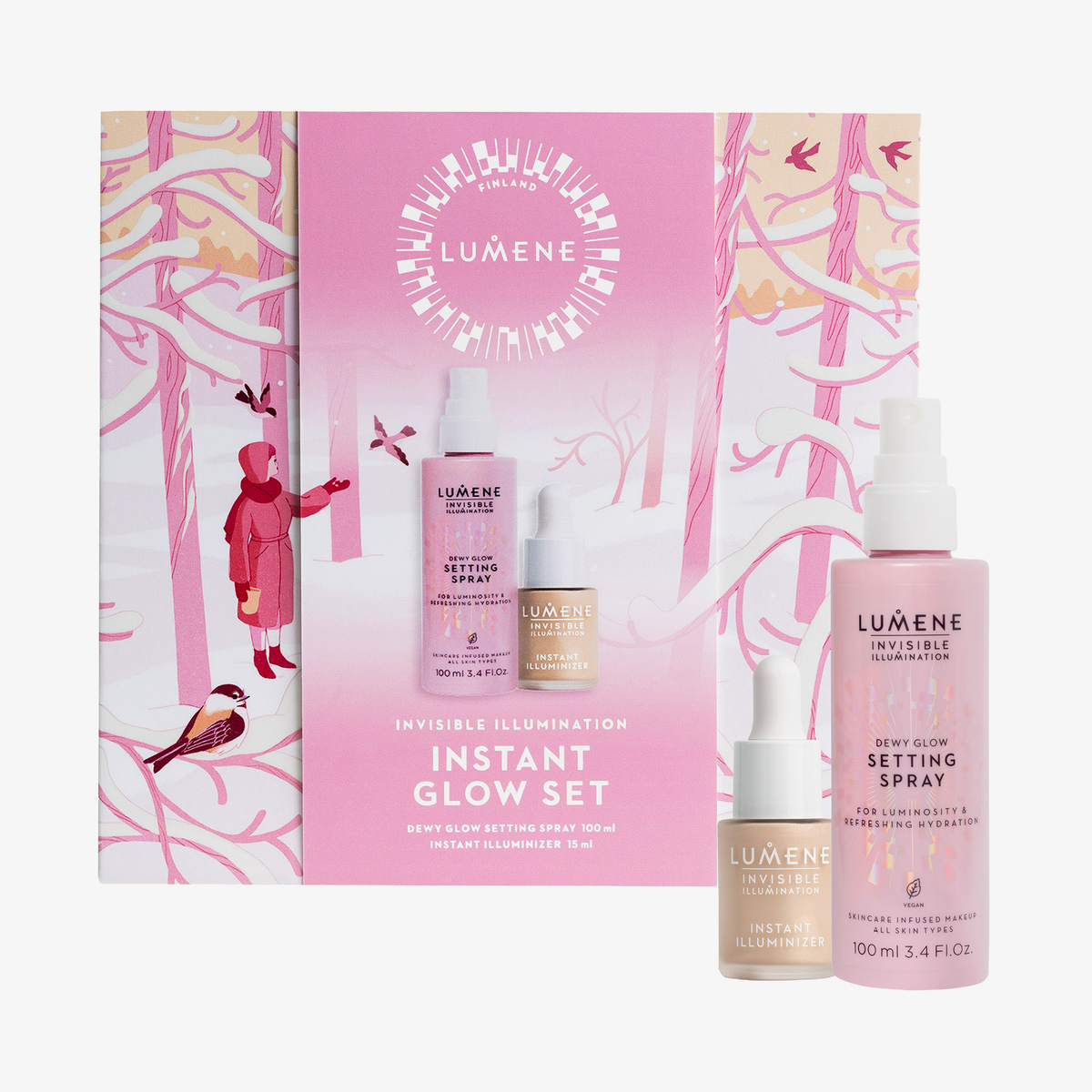 Das Lumene Invisible Illumination Luminous Glow Set 2025 enthält drei Hautpflegeprodukte mit einer illustrierten rosa Winterverpackung im Hintergrund.