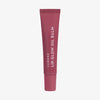 Dunkle beerenfarbene Tube des Lumene Lip Glow Oil Balm Raspberry vor weißem Hintergrund