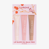 Das Lumene Lip Glow Oil Balm Set 2025 enthält drei Tuben in Creme-, Rosa- und Brauntönen, die jeweils mit einer blumigen Verpackung versehen sind.
