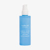 Eine blaue Lumene Nordic Hydra [LÄHDE] Hydrating Lotion Moisturizer Flasche mit weißem Pumpverschluss.