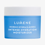 Ein blauer Tiegel von Lumene Nordic Hydra [LÄHDE] Intense Hydration Moisturizer mit weißem Deckel und Text.