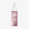 Transparente Serumflasche Lumene NORDIC BLOOM [LUMO] Vegan Collagen Essence mit weißem Tropfverschluss und rosaner Flüssigkeit.