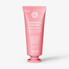 Eine rosafarbene Tube der maria nila Booster Masque Luminous Colour steht aufrecht vor einem weißen Hintergrund.
