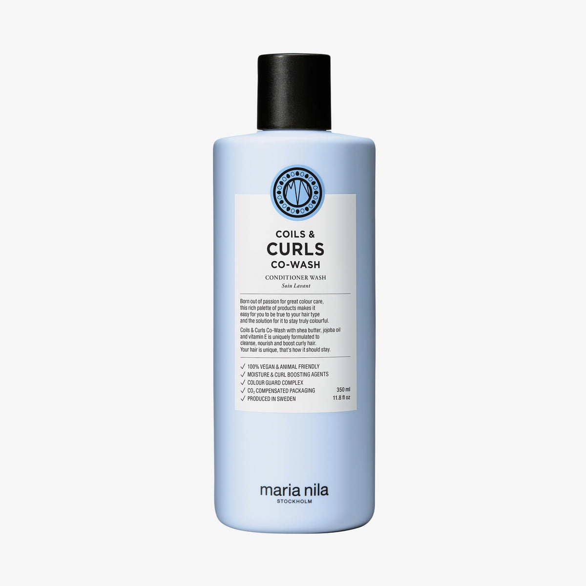 Eine hellblaue Flasche maria nila Coils & Curls Co-Wash mit schwarzem Verschluss und weißem Etikett mit Text.
