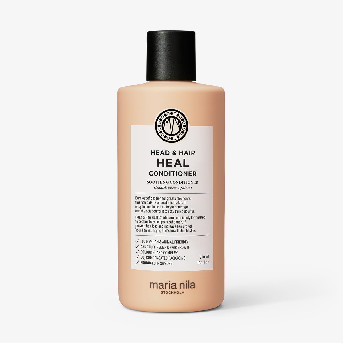 Pfirsichfarbene Flasche Head & Hair Heal Conditioner mit schwarzem Deckel auf weißem Hintergrund.