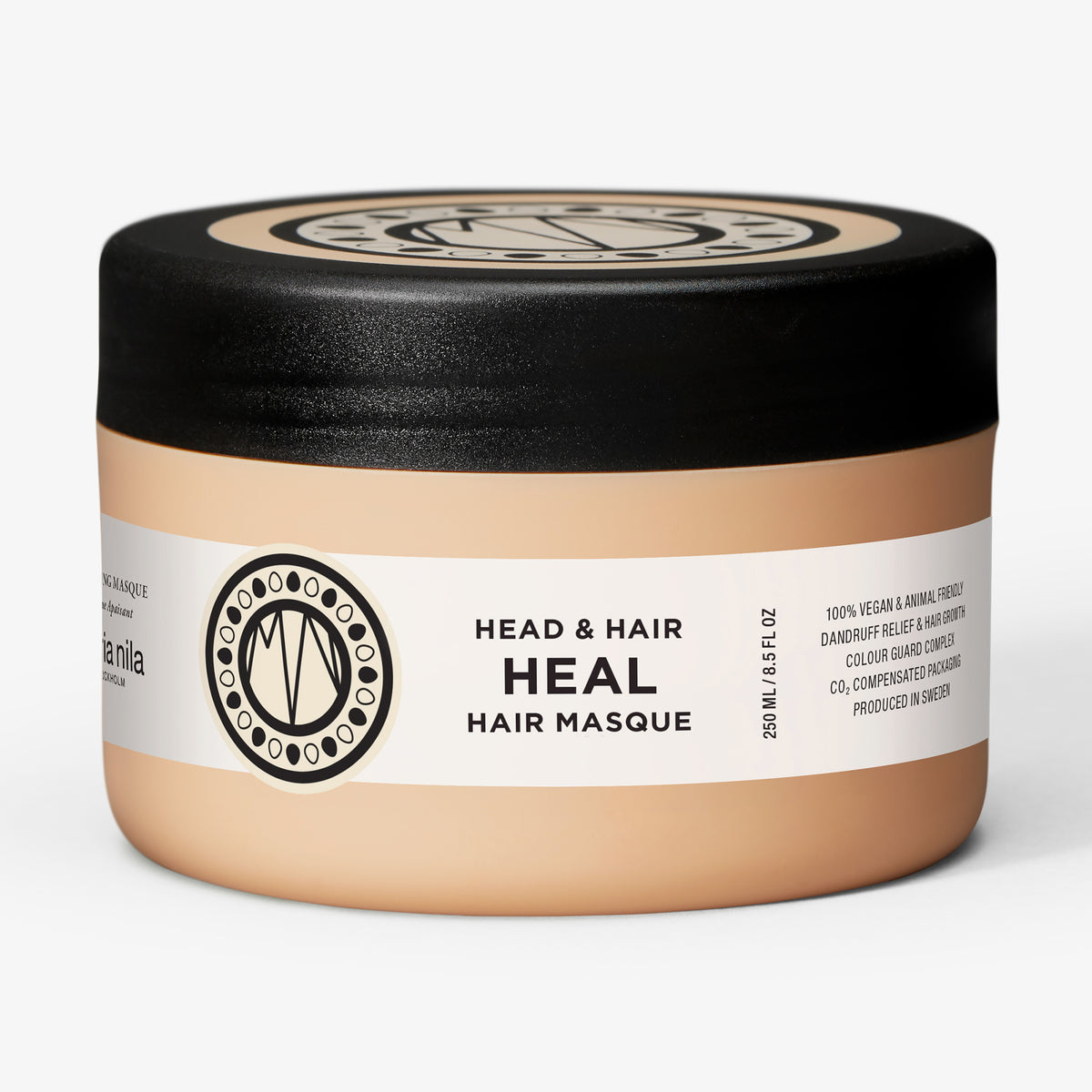 Ein pfirsichfarbener Tiegel der maria nila Head & Hair Heal Masque mit schwarzem Deckel auf weißem Hintergrund.