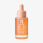 Eine Flasche orangem maria nila Head & Hair Heal Soothing Serum mit einem Tropfverschluss auf weißem Hintergrund.