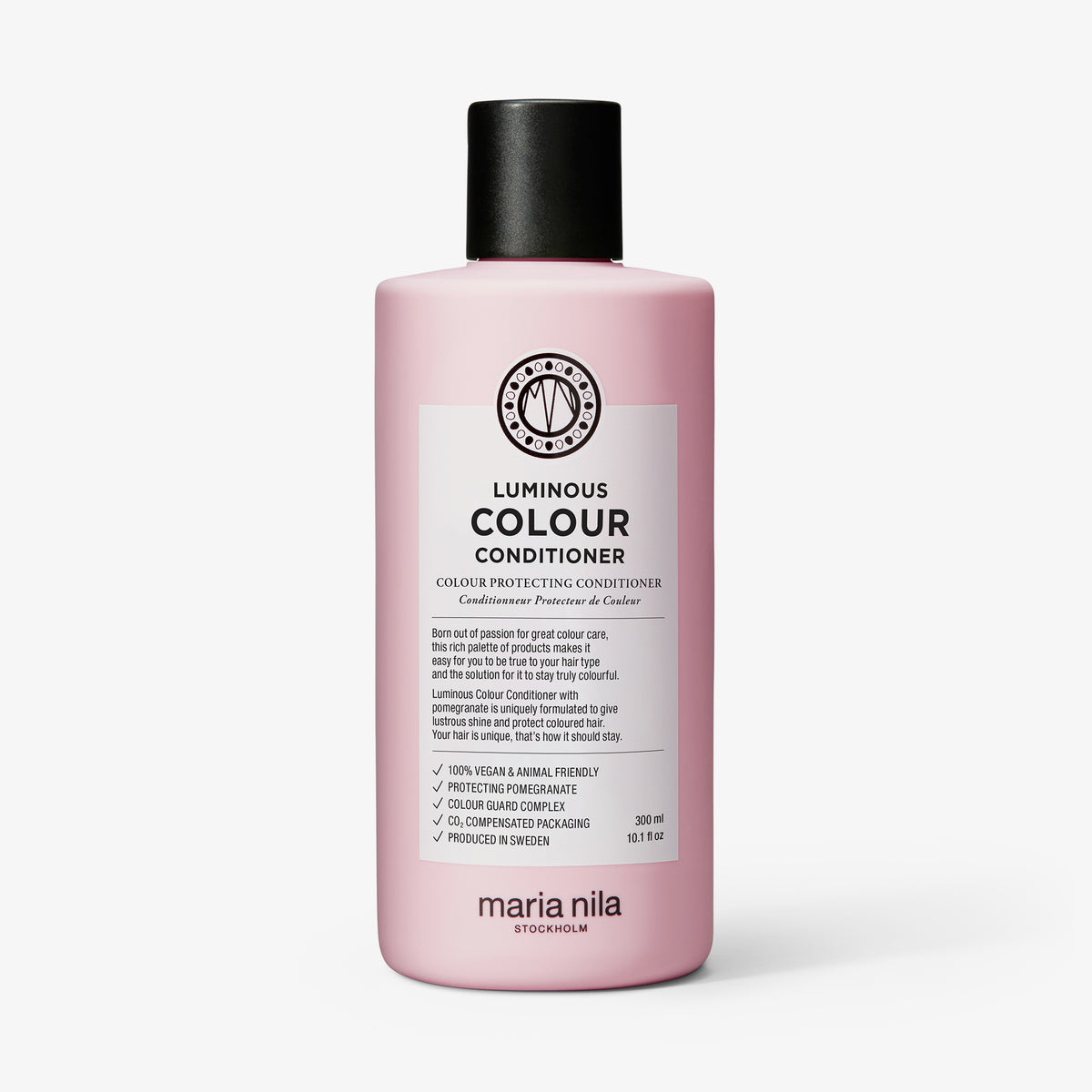 Eine rosa Flasche maria nila Luminous Colour Conditioner mit schwarzer Kappe und detailliertem Etikett.