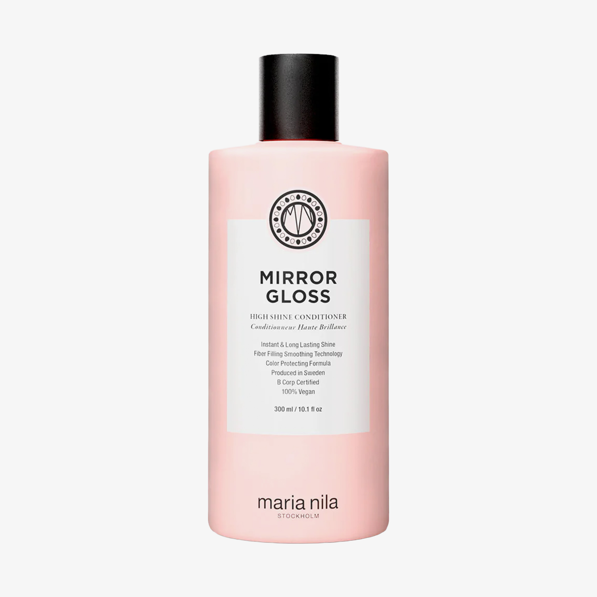 Eine rosa Flasche „Maria Nila Mirror Gloss Conditioner“ mit einem weißen Etikett und schwarzer Schrift.