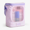 Eckige rosafarbene Pure Volume Beauty Bag 2025 mit Meshfenster enthält Pure Volume Shampoo, Conditioner und Argan Oil von Maria Nila.