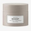 Beigefarbener Tiegel der maria nila Schist Fibre Cream mit weißem Etikett und schwarzem Text.