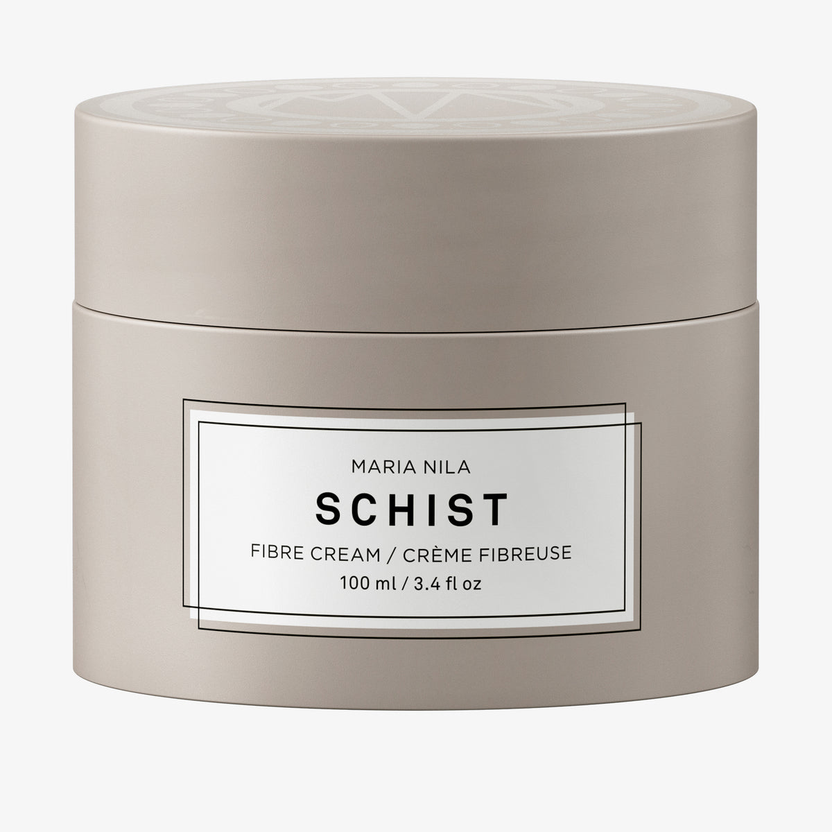 Beigefarbener Tiegel der maria nila Schist Fibre Cream mit weißem Etikett und schwarzem Text.