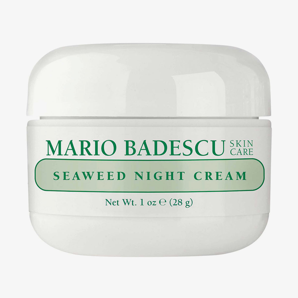 Weißer Tiegel der Mario Badescu Seaweed Night Cream mit grünem Etikett auf weißem Hintergrund.
