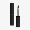 Mesauda Beauty Brow a Spell Augenbrauengel in Schwarz, abgebildet mit dem Applikator und dem geöffneten Deckel neben der Tube.