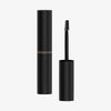 Die Tube des Brow a Spell Augenbrauengels von Mesauda Beauty mit abgenommenem Applikator, der den Applikator mit Borsten zeigt.