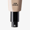 Beigefarbene Flasche von Mesauda Beauty Dew Shield mit einem schwarzen Pumpspender, Nahaufnahme auf weißem Hintergrund.