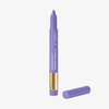 Ein lilafarbener NABLA Cosmetics Cupids Arrow Longwear Stylo Lippenstift mit einem goldenen Band und ohne Kappe.