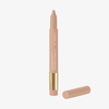 Cupids Arrow Longwear Stylo von NABLA Cosmetics steht aufrecht, mit abgenommener Kappe, in Beige mit einem goldenen Akzent auf weißem Hintergrund.