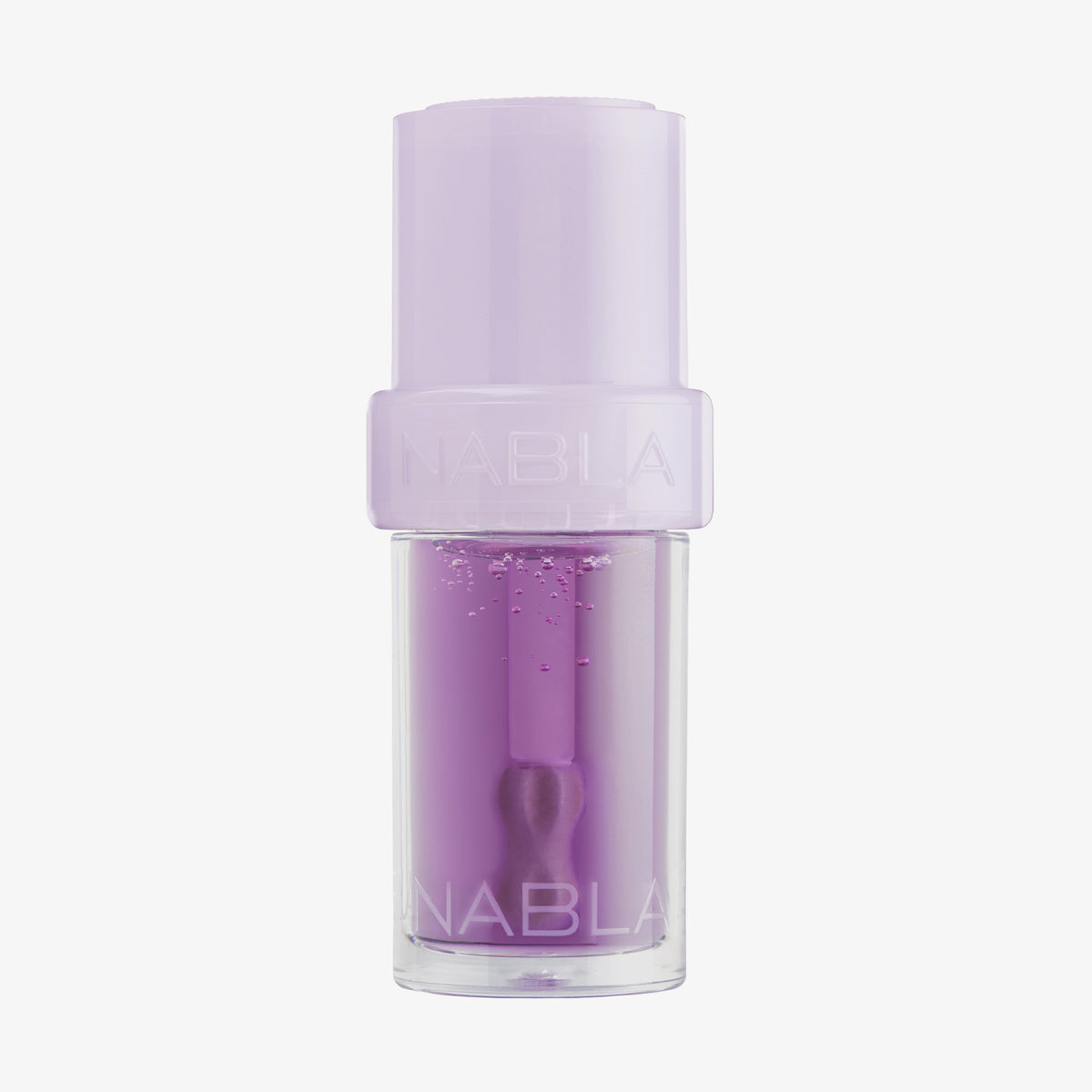 Lila Lip Candy Oil in Grape von NABLA in transparenter Verpackung mit fliederfarbenem Deckel und glänzender, pflegender Textur.