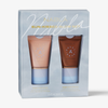 Das NABLA Cosmetics Sun-Kissed Glow Set besteht aus zwei Tuben mit den Bezeichnungen Bright und Bronze, verpackt in einer blau-goldenen Schachtel.