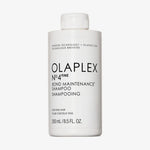 Weiße Flasche OLAPLEX N°4 FINE Bond Maintenance Shampoo mit schwarzem Text auf weißem Hintergrund.