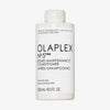 Weiße Flasche OLAPLEX N°5 FINE Bond Maintenance Conditioner mit schwarem Text vor weißem HIntergrund.
