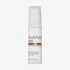 Weiße Pumpflasche des N°9 Bond Protector Nourishing Hair Serum mit transparentem Deckel auf weißem Hintergrund.