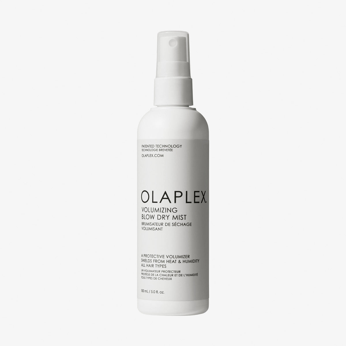 Weißer Sprühflasche des OLAPLEX Volumizing Blow Dry Mist auf weißem Hintergrund.