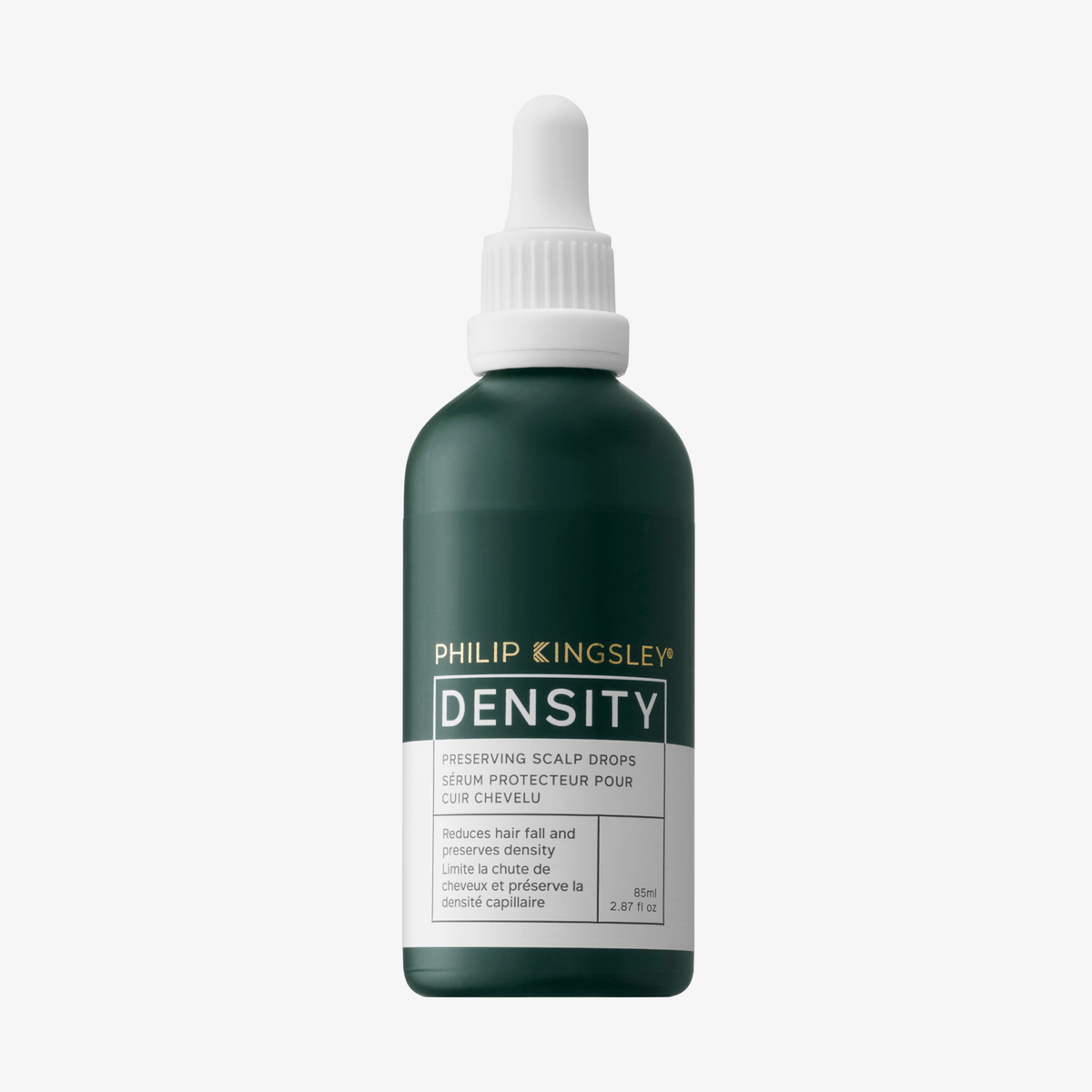 Eine grüne Flasche „Philip Kingsley Density Preserving Scalp Drops“ mit einer weißen Tropfkappe vor einem weißen Hintergrund.