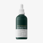 Eine grüne Flasche „Philip Kingsley Density Preserving Scalp Drops“ mit einer weißen Tropfkappe vor einem weißen Hintergrund.