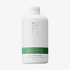 Philip Kingsley Shampoo gegen schuppige, juckende Kopfhaut in einer weißen Flasche mit grünem Etikett, abgebildet vor einem einfarbigen Hintergrund.