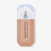 Eine rautenförmige Flasche Physicians Formula Mineral Wear Diamond Perfector BB Cream mit holografischem Verschluss.