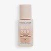 Flasche Skin Silk Serum Foundation im Farbton F9 auf weißem Hintergrund.