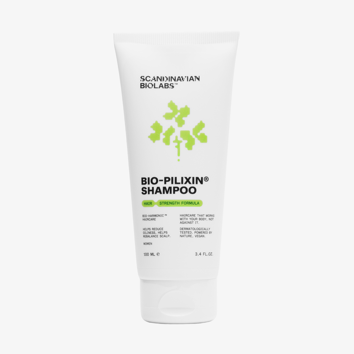Weiße Tube von Scandinavian Biolabs Bio-Pilixin® Shampoo+Women mit grünem und schwarzem Text auf weißem Hintergrund.