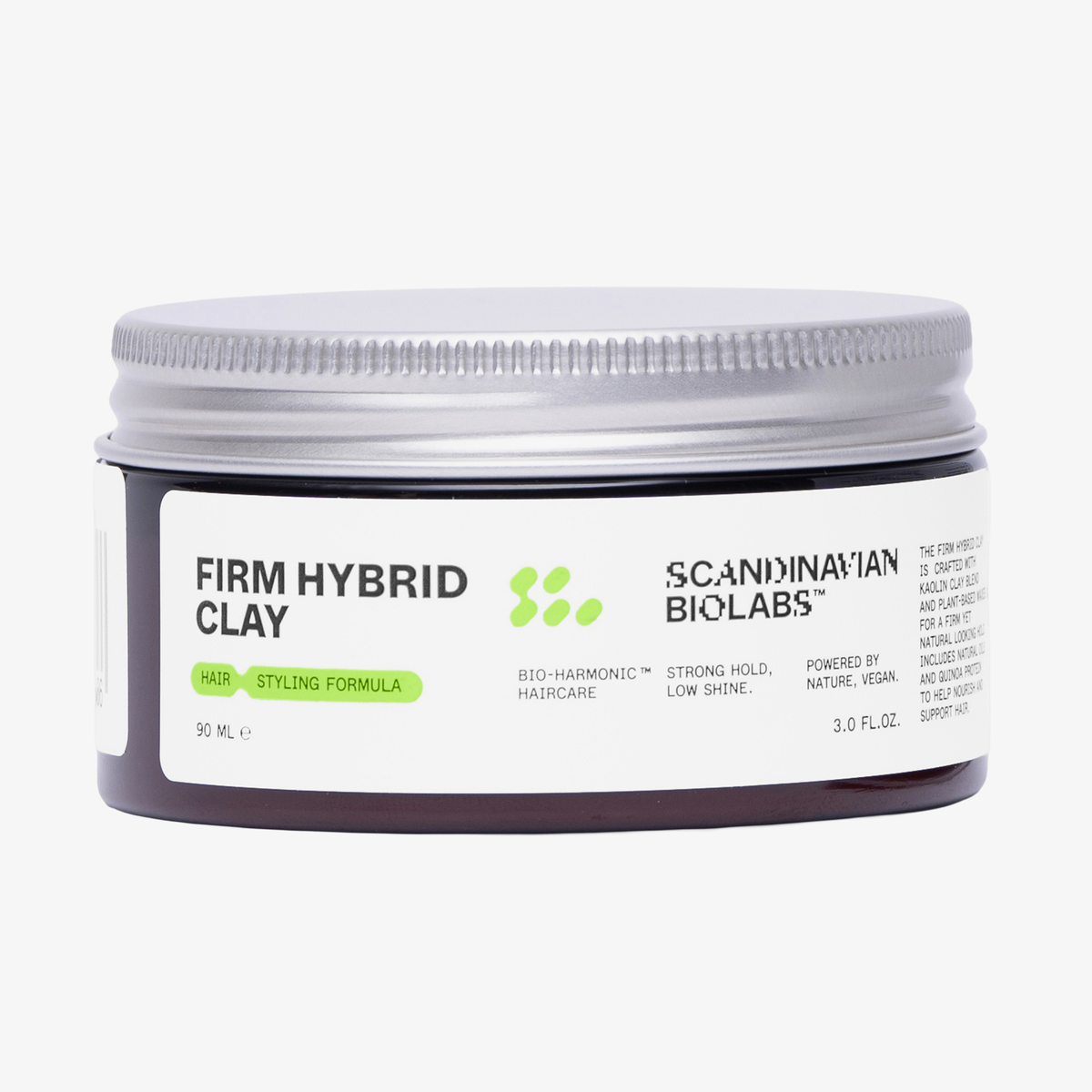 Ein 90-ml-Glastiegel der Scandinavian Biolabs Firm Hybrid Clay Haarstyling-Formel mit einem silbernen Deckel.