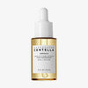 Eine 30ml Tropfflasche mit Madagascar Centella Ampoule, einem weißen Etikett und einer goldenen Flüssigkeit im Inneren.