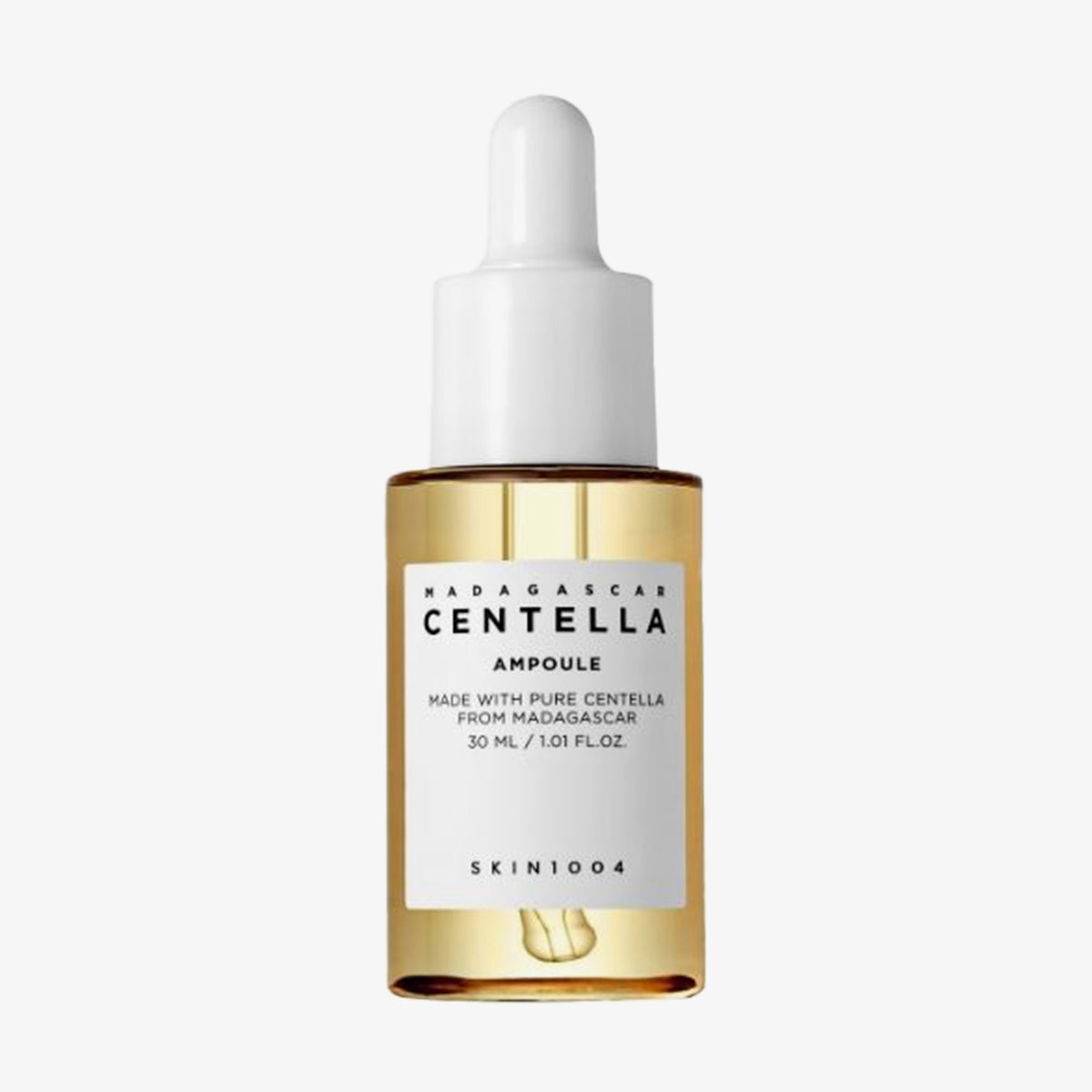Eine 30ml Tropfflasche mit Madagascar Centella Ampoule, einem weißen Etikett und einer goldenen Flüssigkeit im Inneren.