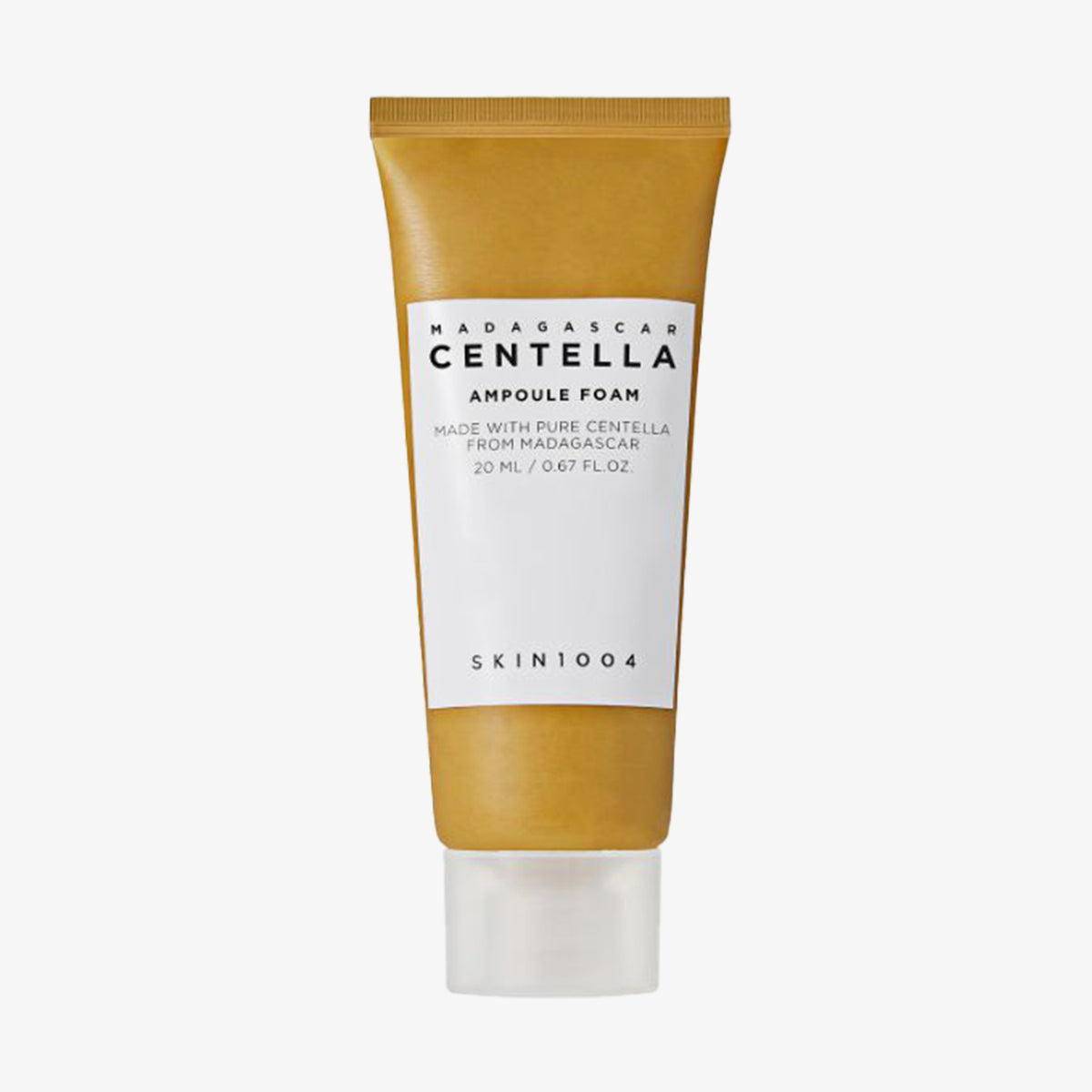 Eine goldene Tube Madagascar Centella Ampoule Foam in 20ml mit weißem Etikett und dursichtiger Kappe.