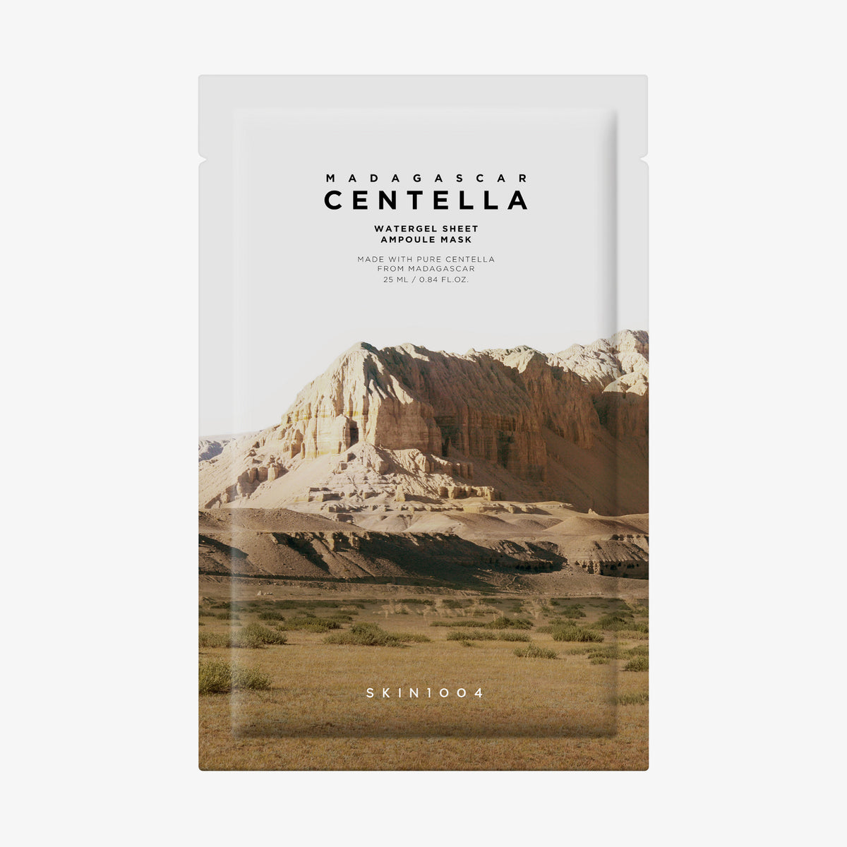 Eine Packung der Madagascar Centella Watergel Sheet Ampoule Mask mit einer Wüstenberglandschaft auf der Vorderseite.
