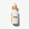Weiße Flasche 100 % reines Arganöl von Timeless Skincare mit Holzdeckel und Pipette vor weißem Hintergrund. 30 ml.