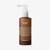 Eine braune Pumpflasche mit dem Scalp Calming Treatment von Transparent Lab vor einem weißen Hintergrund.