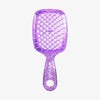 Die UNbrush Detangling Hair Brush Mini ist eine glitzernde lilafarbene Bürste mit einem belüfteten Paddel mit Wabenmuster und einem ergonomischen Griff.
